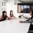three women sitting at the table
